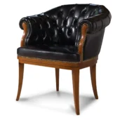 Black leather armchair with a curved back and buttoned upholstery, resting on a wooden base with wooden legs.